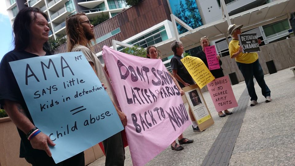 Protesters gather outside the federal court to support Latifar, new born son and family's request for an injunction against being returned to Nauru